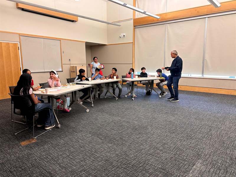 Kids engaged in a scenario at The Situation Room